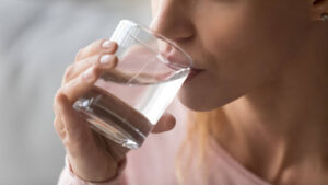 Woman drinking glass of water